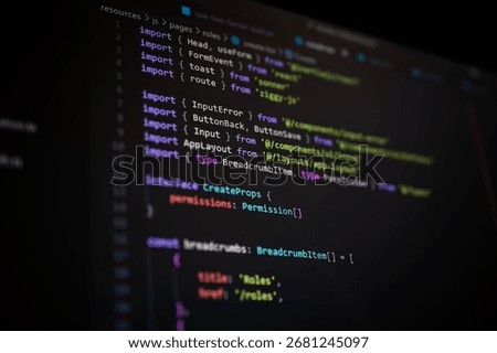 Close-up of TypeScript code on dark editor screen showing module imports, interface declarations, and frontend components, ideal for concepts of web app development, UI frameworks, and coding design.