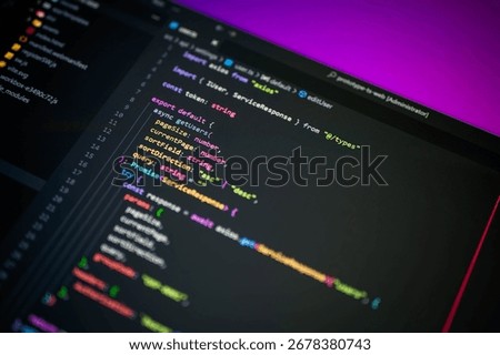 Close-up of TypeScript programming code in a dark mode editor wi