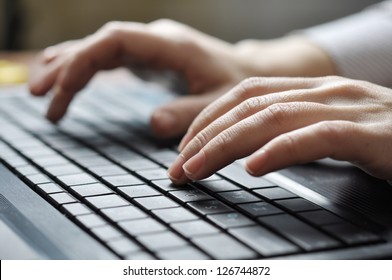 Close-up of typing female hands on keyboard - Shutterstock ID 126744872