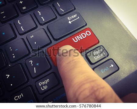 Close-up the UNDO button on the keyboard and have Red button isolate black keyboard
