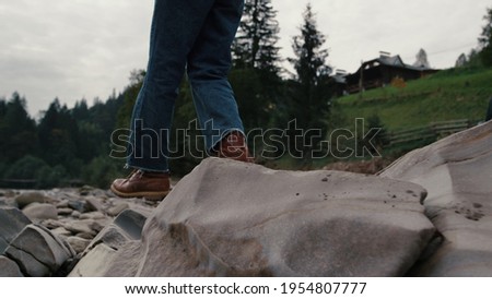 Similar – Feet standing on stone spiral staircase