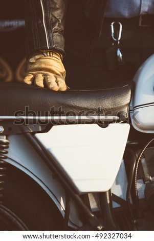 Similar – Senior man repairing damaged motorcycle engine