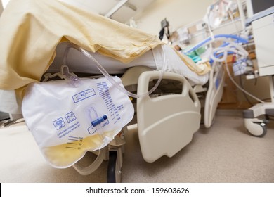 Closeup of urine bag attached to bed in hospital