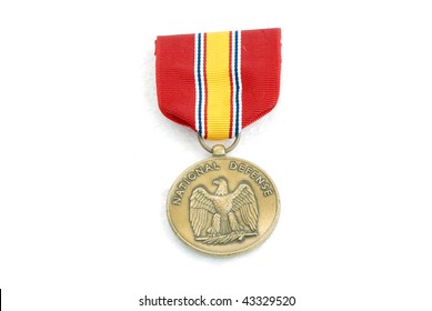 Closeup Of US Army National Defense Medal Isolated On White.