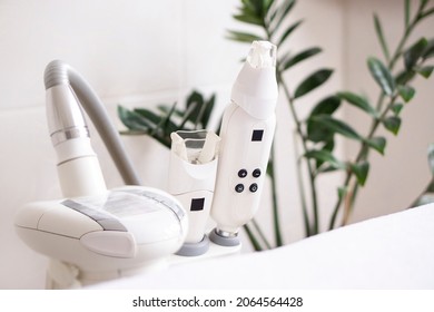 Closeup  vacuum roller massage apparatus for face and body  on medical cabinet background with copy space. LPG for face lifting. - Shutterstock ID 2064564428
