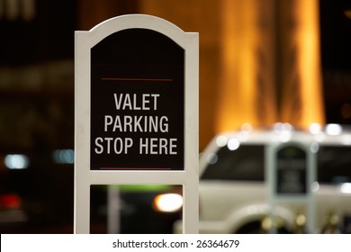 Closeup of Valet parking - stop here sign. Shallow focus depth