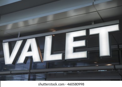 Closeup Of Valet Parking - Stop Here Sign.