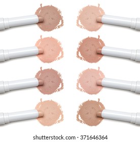 Close-up of various colors and shades of makeup concealer pencil on white background. Light and dark tones for different skin types
