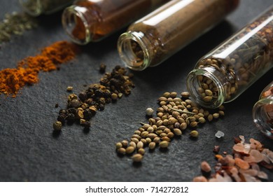 Close-up of various spices spilled out of jar - Powered by Shutterstock