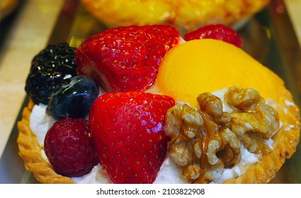 Close-up Vibrant Color Of Fruits Tart Bakery Sweet Dessert Colorful Strawberry Blueberry Walnut Rasberry Peach And Cream