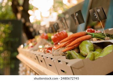 Closeup of vibrant freshly harvested organic produce at farmers market. Locally grown fruits and vegetables with price tags and bio products are available at the outdoor farm fair trade booth. - Powered by Shutterstock