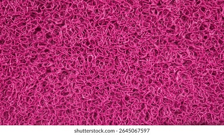 Close-up of a vibrant fuchsia pink spaghetti mat (coil mat) texture, creating a lively and abstract background with tangled loops - Powered by Shutterstock - Get 15% off with code: PIKWIZARD15