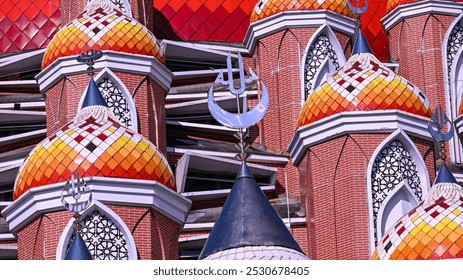 close-up of vibrant mosaic domes with geometric patterns and crescent moon symbols.
 - Powered by Shutterstock