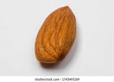 Close-up View Of An Almond On White Background. 