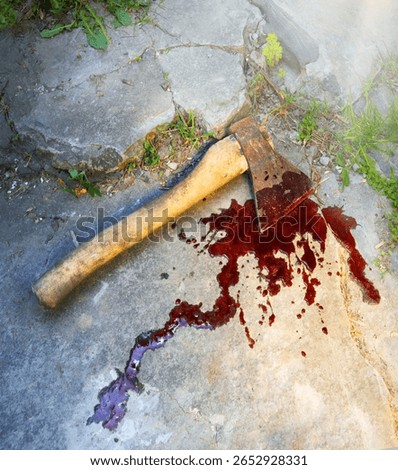 Closeup view attack heavy hard hit male human worker hand victim lay grass land crack stone rock floor. Evil anger fear creepy close up dirt red bleed splatter drip spot man body arm farm life scene