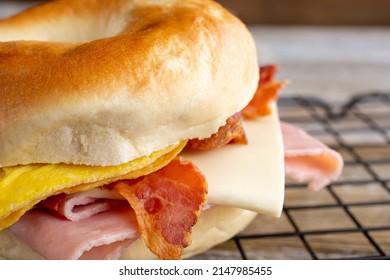 A Closeup View Of A Bagel Breakfast Sandwich.