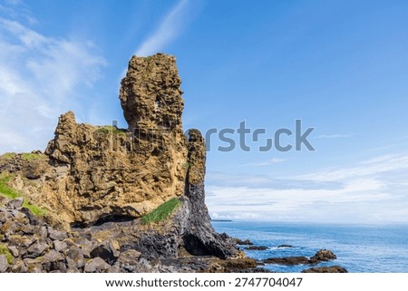 A close-up view of the Lóndrangar basalt rock pinnacles, found on the Snaefellsnes peninsular outside the town of Hellnar, Iceland.