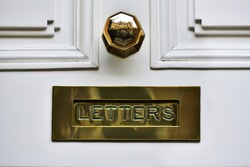 Close-up View Of A Beautiful Letter Box On A House Front Door