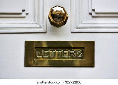 Close-up View Of A Beautiful Letter Box On A House Front Door