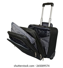 Close-up View To Black Suitcase With Telescoping Metal Handles And Wheels Made From A Black Ballistic Nylon Against White Background