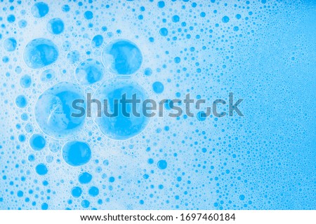A close-up view of the blue water bubble, background images and science.
