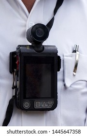 Closeup View Of A Body Worn Camera To Shoot Photo Or Video In Law And Order Enforcement By Indian Police Officer                               