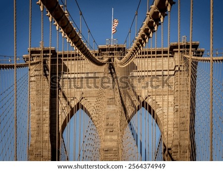 Similar – Image, Stock Photo Close-up view of Brooklyn Bridge’s cable with Manhattan backdrop
