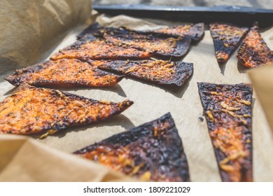 Closeup view of burnt pizza slices
