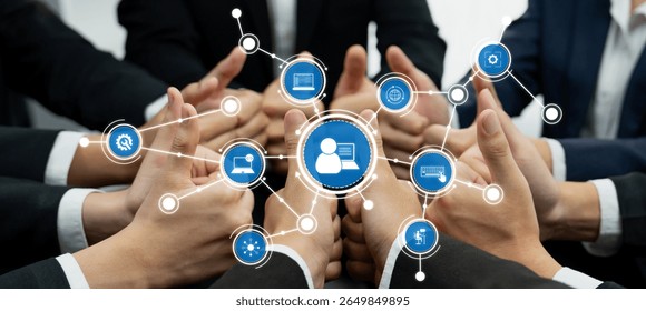 A close-up view of business professionals engaging in collaborative efforts, with digital data icons symbolizing innovation and teamwork in a modern office setting. Amity