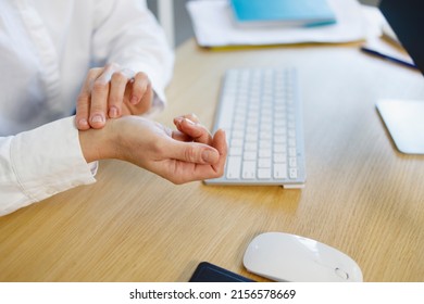 Closeup View Of Business Woman's Hands Measuring Her Hearth Rate