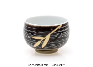 closeup view of ceramic cup for tea on white background  