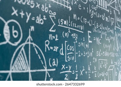 Close-up view of a chalkboard covered with mathematical equations, graphs, and scientific formulas. Perfect for content about education, science, academic studies, classroom learning, and logic. - Powered by Shutterstock - Get 15% off with code: PIKWIZARD15