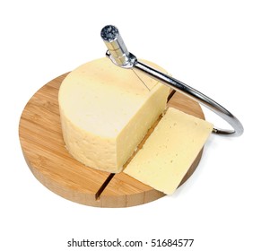 Close-up view to cheese cutter on white background. Studio shot, not isolated. - Powered by Shutterstock