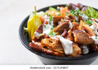 A Closeup View Of A Chicken Shawarma Salad Bowl.