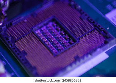 Close-up view of a CPU socket on a motherboard. The socket is a critical component that connects the central processing unit (CPU) to the motherboard. Old electronics close-up. Electronic background. - Powered by Shutterstock - Get 15% off with code: PIKWIZARD15