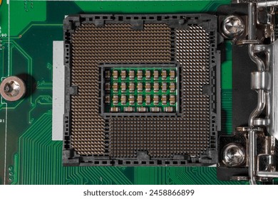 Close-up view of a CPU socket on a motherboard. The socket is a critical component that connects the central processing unit (CPU) to the motherboard. Old electronics close-up. Electronic background.