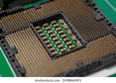 Close-up view of a CPU socket on a motherboard. The socket is a critical component that connects the central processing unit (CPU) to the motherboard. Old electronics close-up. Electronic background. 
