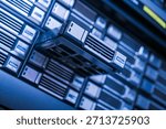 A close-up view of a data server storage device in an advanced data center, showcasing modern technology and efficient hardware solutions for data management.