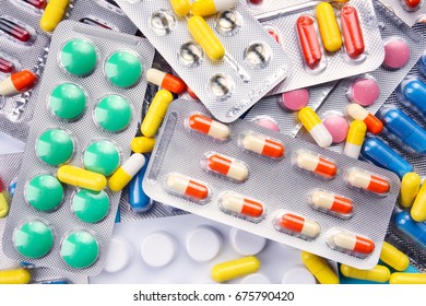 Closeup view of different pills - Shutterstock ID 675790420