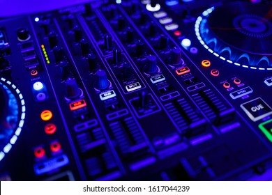 Closeup View Of A DJ's Mixing Desk