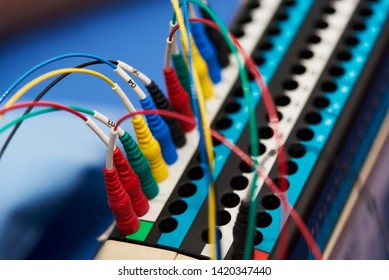 Close-up View Of EEG Machine Cables Plugged-in To The Socket