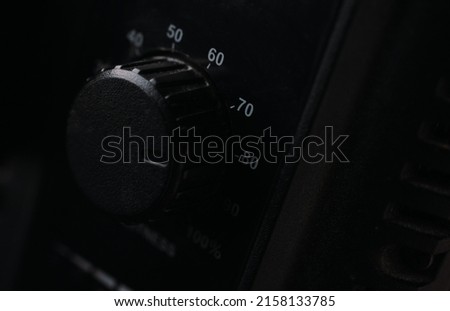 Close-up view of the electric control dial