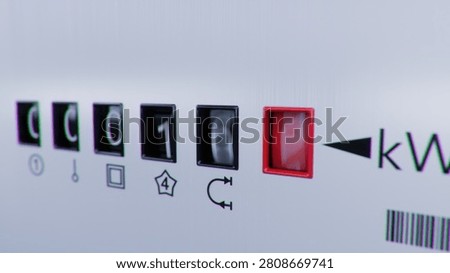 Close-up view of electrometer measuring electricity consumption. Animation with kWh counter. Electric meter display changing numbers. Concept of rising costs of electric power. Home power supply.