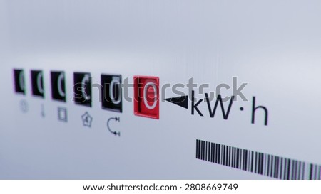 Close-up view of electrometer measuring electricity consumption. Animation with kWh counter. Electric meter display changing numbers. Concept of rising costs of electric power. Home power supply.