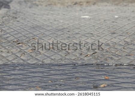 Close-up view of the floor in an old wagon with selective focus. Grunge metal texture