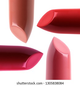 Closeup View Of Four Different Colored Lipsticks On White Background. Makeup, Cosmetics And Drugstore Concept