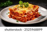 A close-up view of a freshly baked lasagna dish, featuring layers of pasta