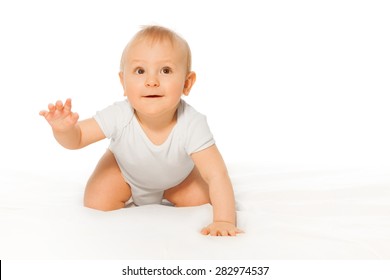 Close-up view of happy baby wearing white bodysuit - Shutterstock ID 282974537
