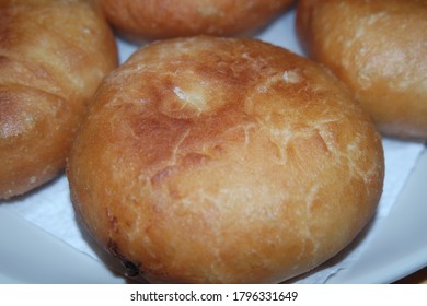 Closeup View Of Homemade Tasty Potato Bread Rolls Bun Placed Over White Tissue Paper.