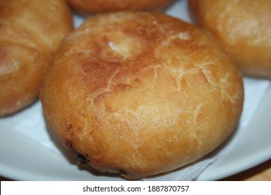 Closeup View Of Homemade Tasty Potato Bread Rolls Bun Placed Over White Tissue Paper.